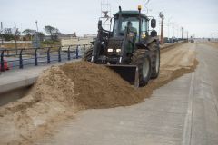 Tractor-clearing-sand-at-Southport
