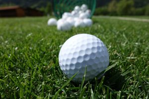 Golf balls on grass
