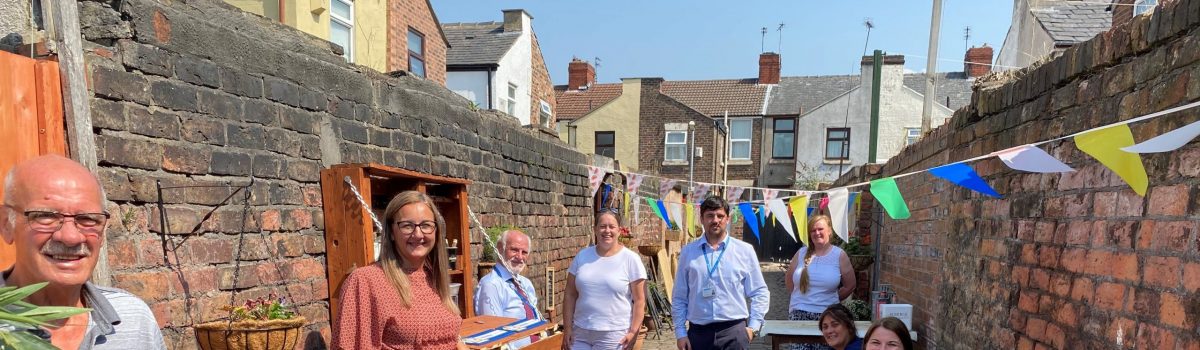 Neighbours from Litherland transform their overgrown alleyway into an amazing community garden