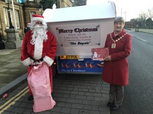 Mayor of Sefton stood with Father Christmas