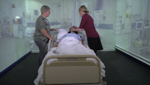 Staff working on a patient in an in-hospital simulation