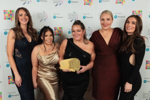 The Redgate Primary team accepting their Gold Award.