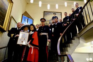 mayor of Sefton and members of HMS Mersey's crew at Bootle Town Hall.